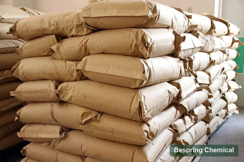 Reference photo of stacked bagged material in a warehouse