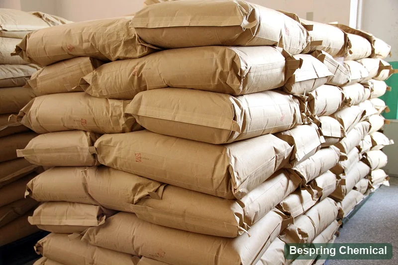 Reference photo of stacked bagged material in a warehouse
