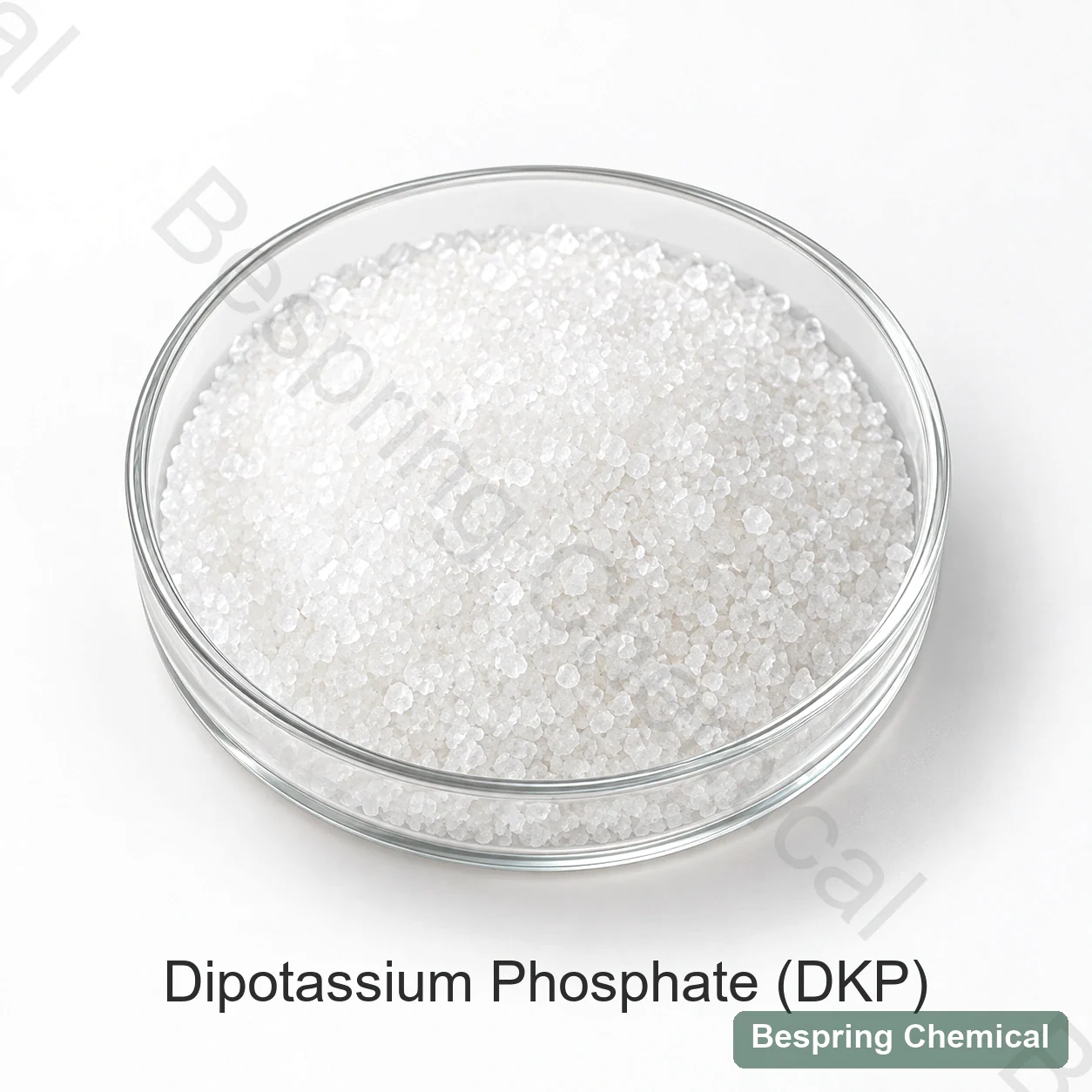 White granules in a glass dish labelled dipotassium phosphate DKP