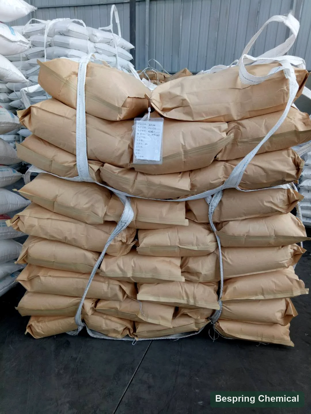 Paper bags secured with lifting straps in a warehouse